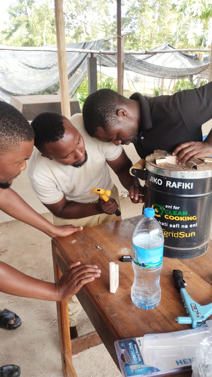 Community member with clean stove